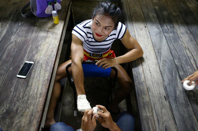 Nong Rose Baan Charoensuk, who is transgender, prepares for a boxing match