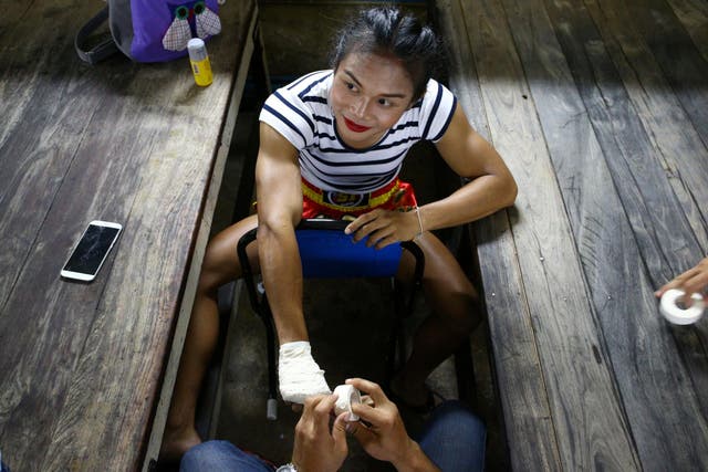 Nong Rose Baan Charoensuk, who is transgender, prepares for a boxing match