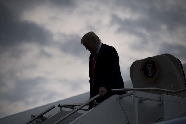 US President Donald Trump leaving Air Force One