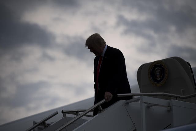 US President Donald Trump disembarks from Air Force One upon arrival at Raleigh County Memorial Airport in Beaver, West Virginia, July 24, 2017