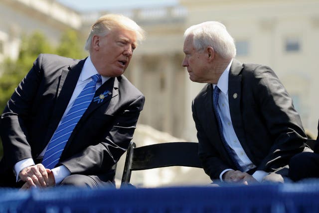 President Donald Trump speaks with Attorney General Jeff Sessions in happier times in May