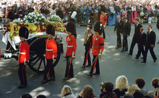 The Duke of Edinburgh, Prince William, the Earl of Spencer, Prince Harry and Prince Charles walk behind the coffin of Diana, Princess of Wales