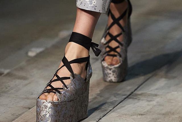 Erdem contrasted a hyper-feminine collection with clunky platform sandals