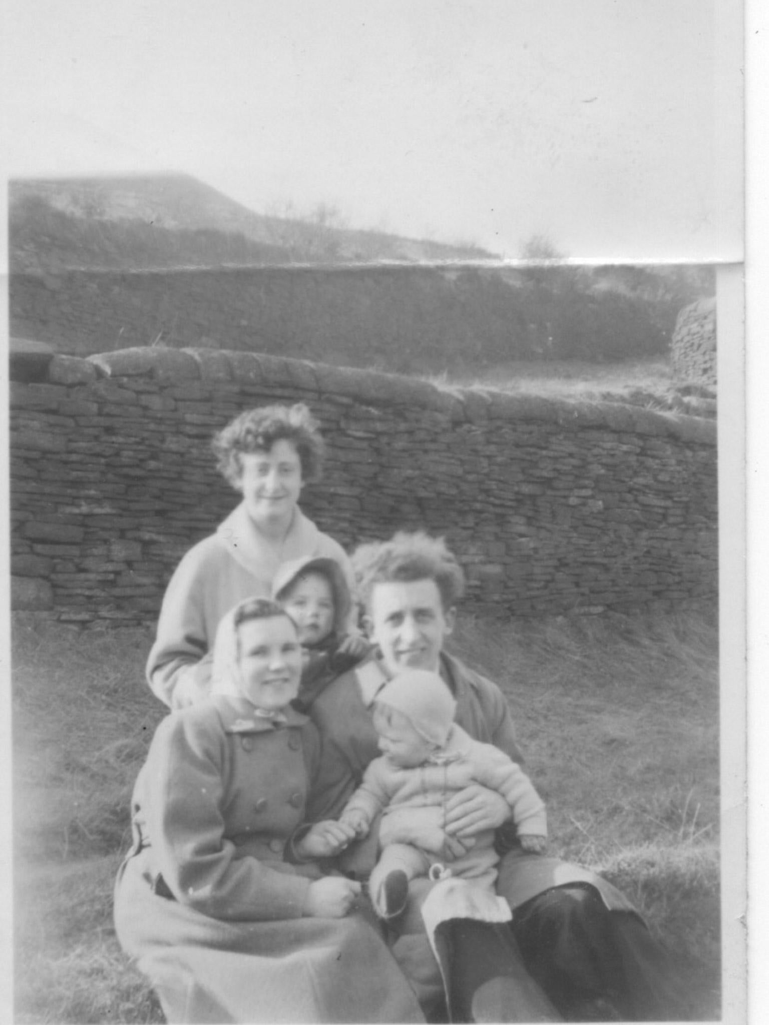 Rosemary and Simon as babies with parents Irene and Walter