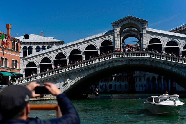 Tourists treat Venice as if it's a beach, authorities say