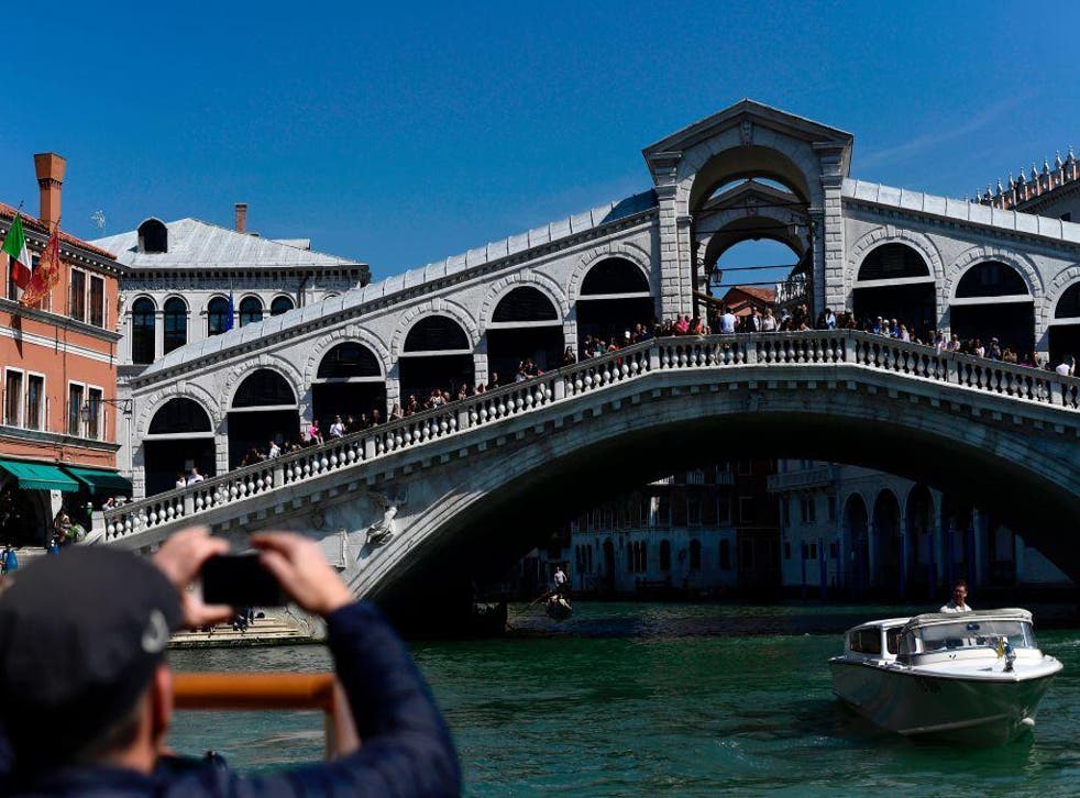 Tourists treat Venice as if it's a beach, authorities say