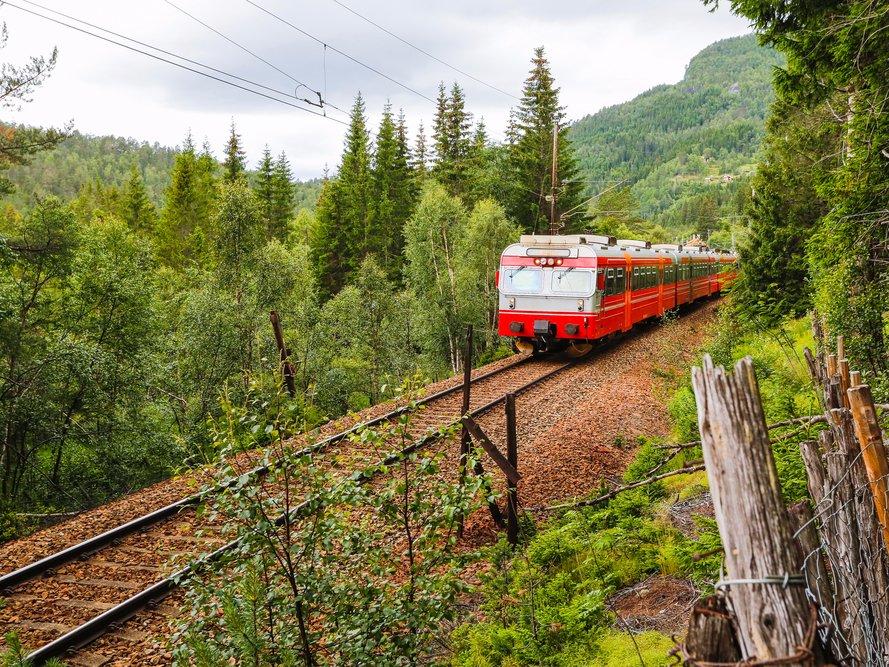 A train travels through the mountains between Bergen and Oslo, Norway.