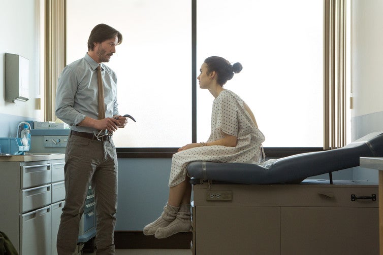 Keanu Reeve’s character plays right into the role of the patriarchal medical professional who can fix women