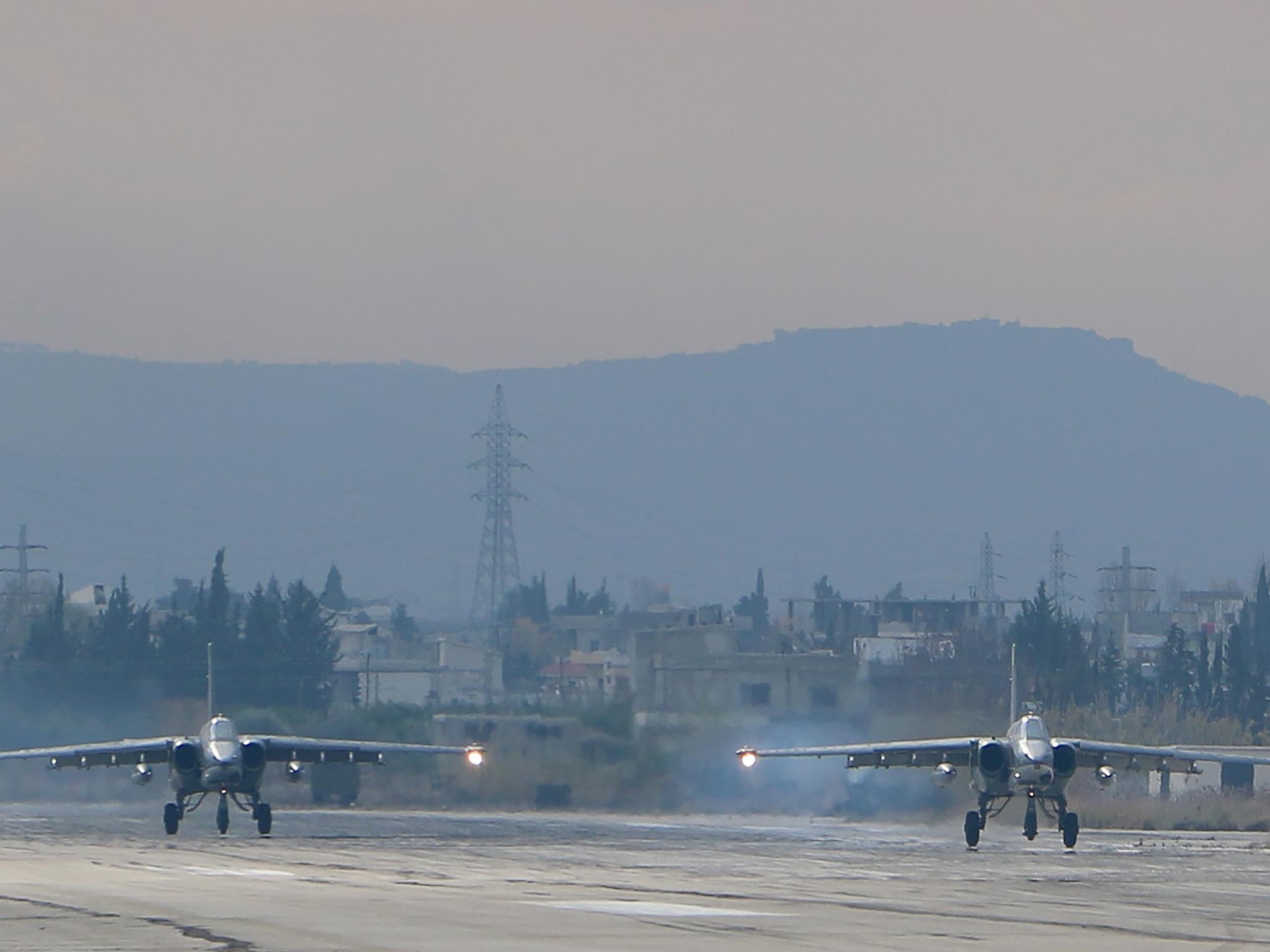 Two Russian Sukhoi Su-25 bombers at the Russian Hmeimim military base in Latakia province, in the northwest of Syria