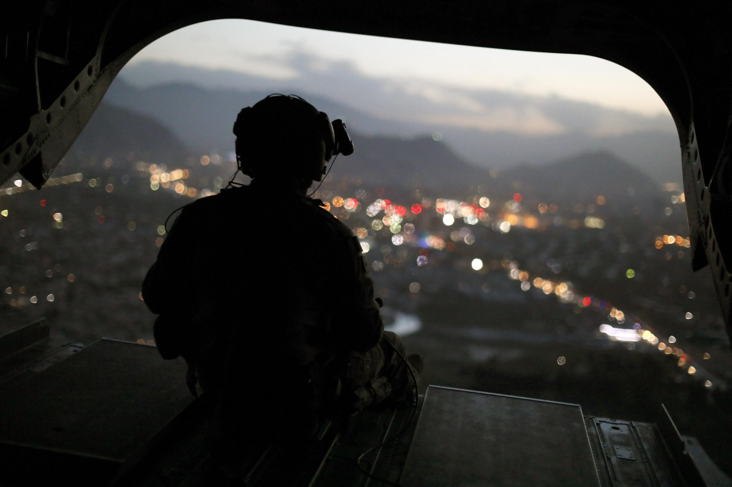 An Army crewman is seen on a military plane in Afghanistan
