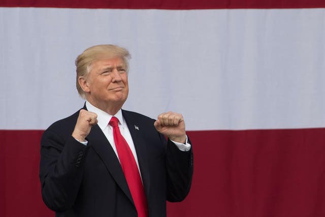 US President Donald Trump gestures during the National Boy Scout Jamboree