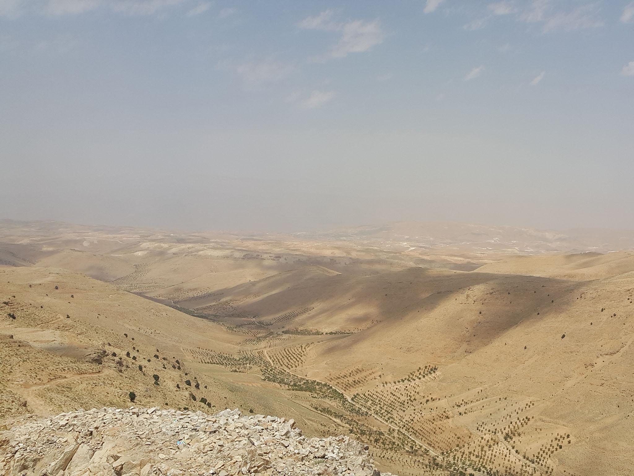 The narrow frontier road in the valley marks the border between Syria (left) and Lebanon (right of the road) in the Qalamoun battlefield