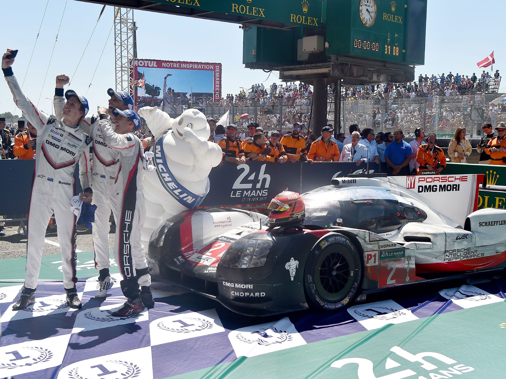 Earl Bamber, Timo Bernhard and Brendon Hartley of Porsche celebrate their win in 2017