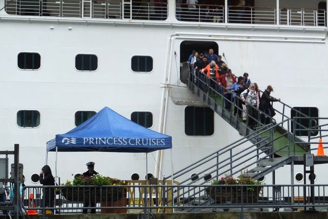 Passengers on the Emerald Princess disembark in Juneau, Alaska on Wednesday