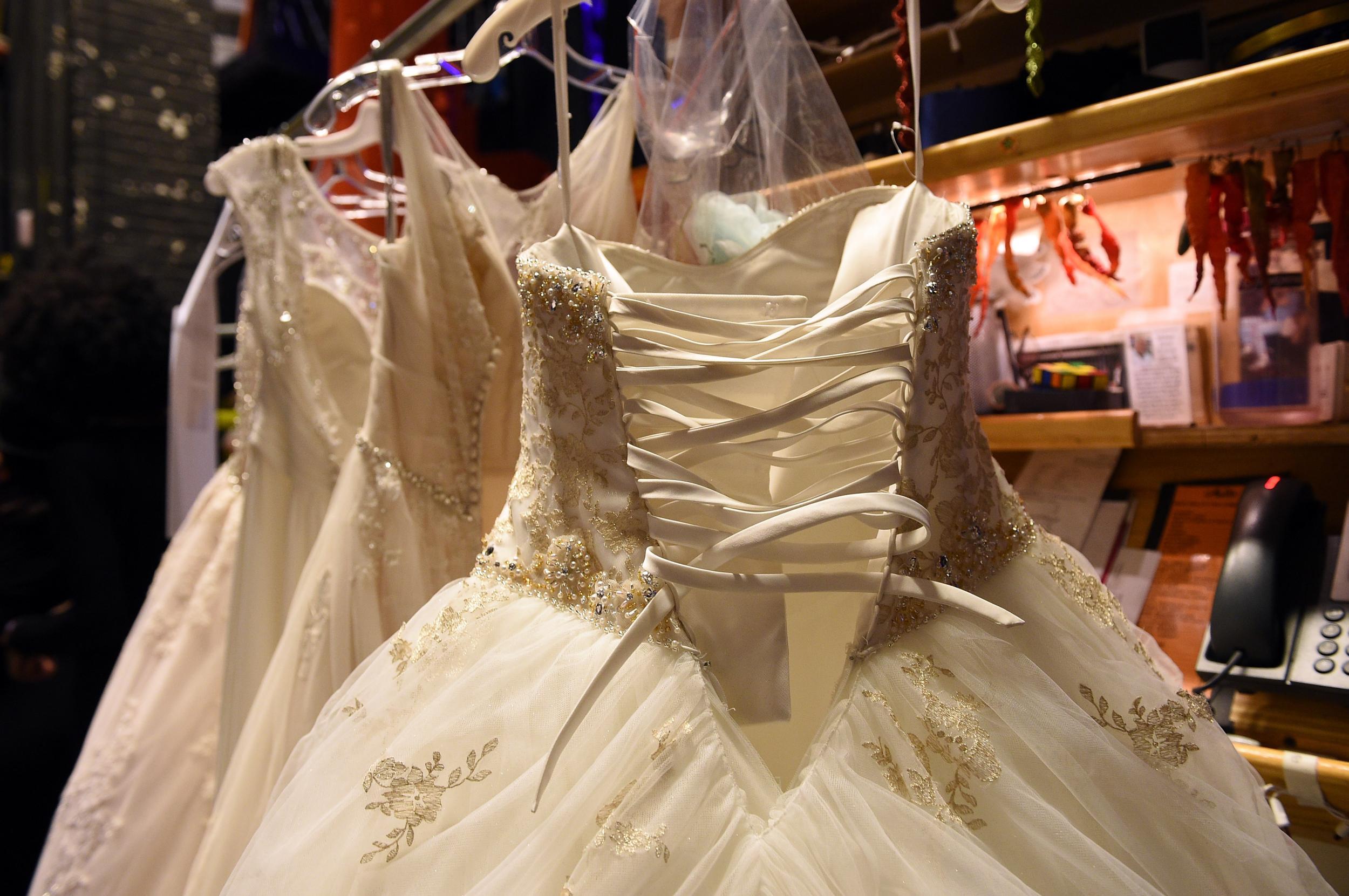 Seamstress from abruptly bankrupt bridal  store  reunites 
