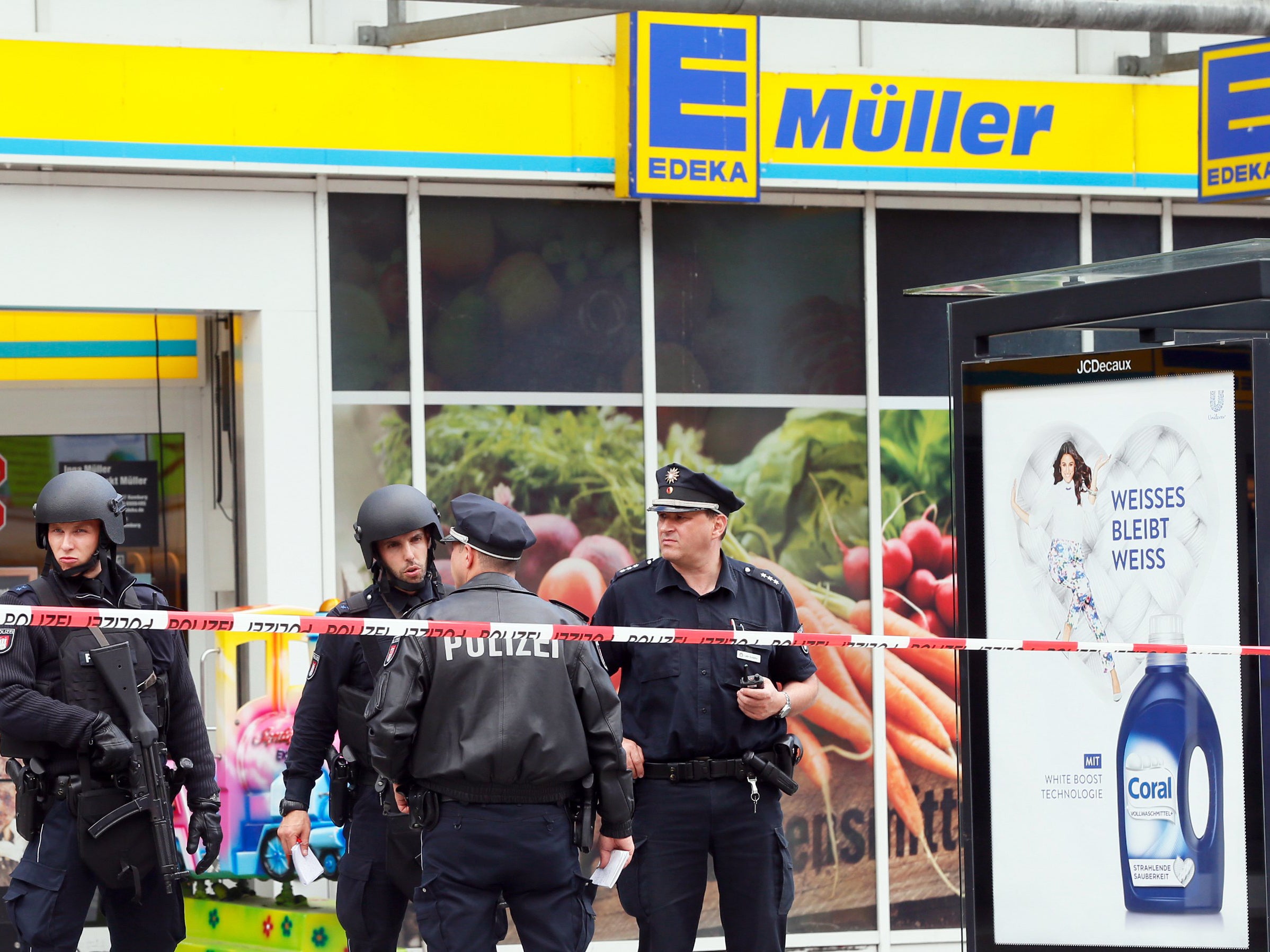 Police outside the supermarket where the attack was carried out