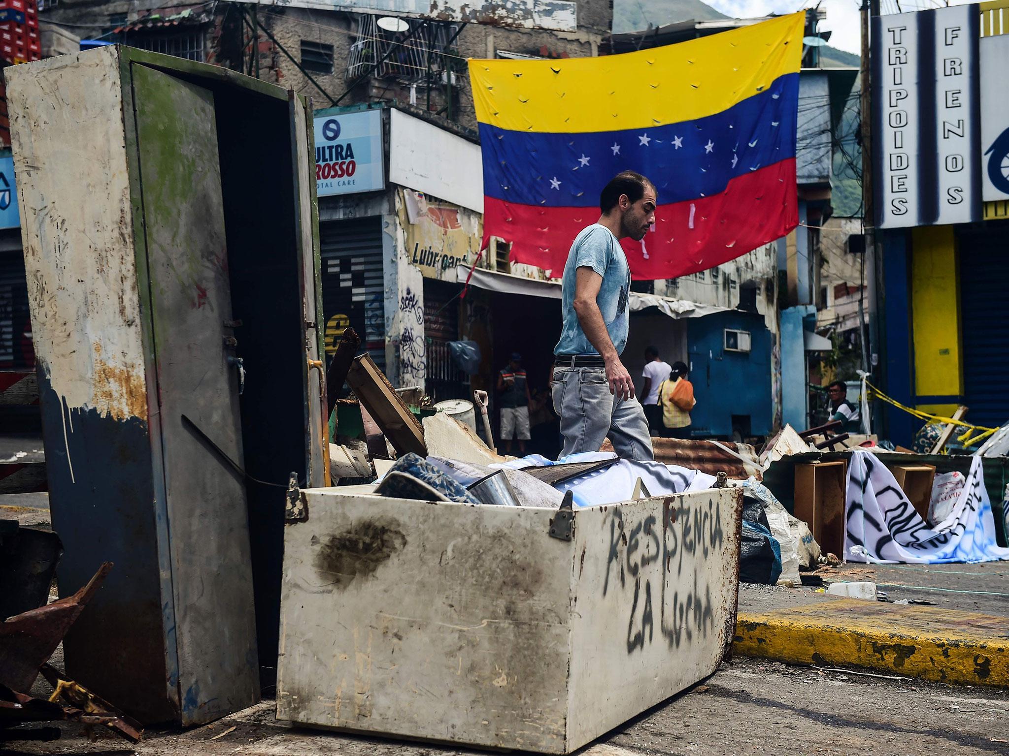 Maduro’s reforms have led to protests on the streets of the capital Caracas