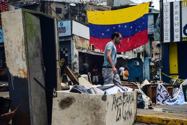 Maduro’s reforms have led to protests on the streets of the capital Caracas