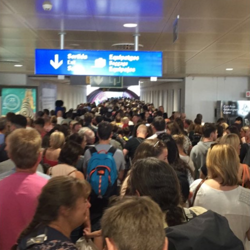 Crush hour: passengers from Britain at Palma airport had to queue for 90 minutes to get through passport control