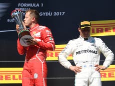 Vettel wins Hungary GP as Hamilton bows to team orders to finish 4th