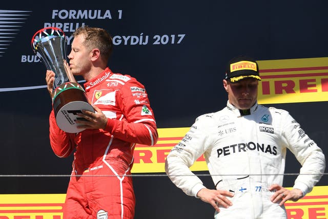 Sebastian Vettel won the Hungarian Grand Prix to increase his lead in the world championship