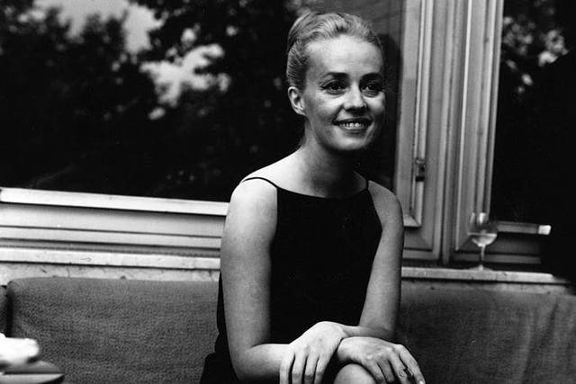French actress and director Jeanne Moreau announces her marriage to fashion designer Pierre Cardin at a press conference