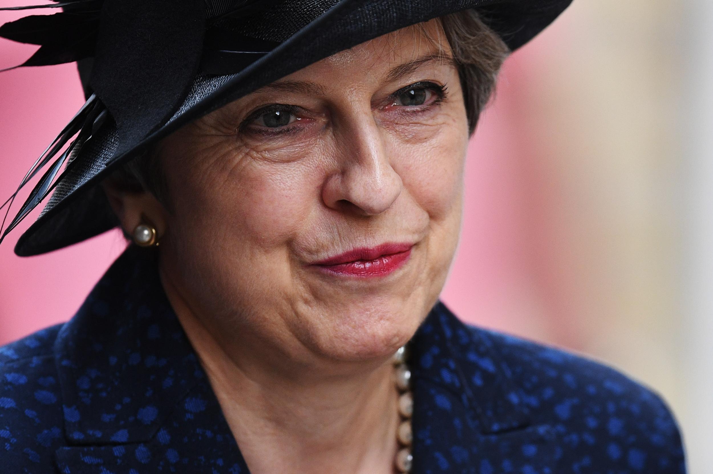 The Prime Minister attends commemorations marking the centenary of Passchendaele as her ministers differ over Brexit