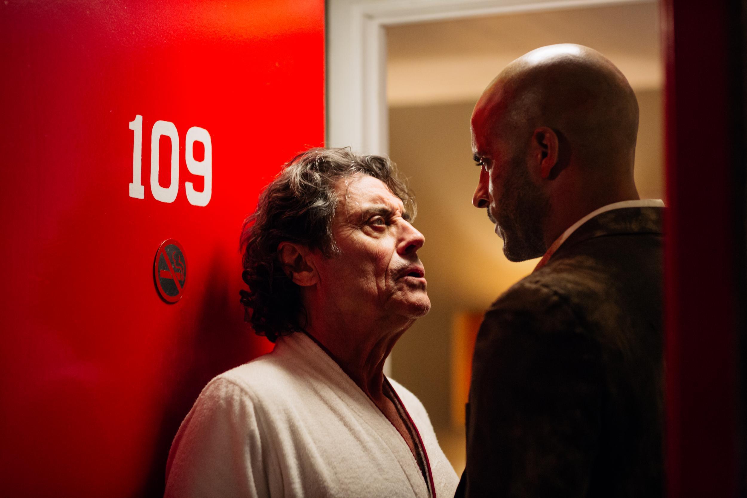 Ian McShane as Mr. Wendesday (left) and Ricky Whittle as Shadow Moon (right) Starz/American Gods