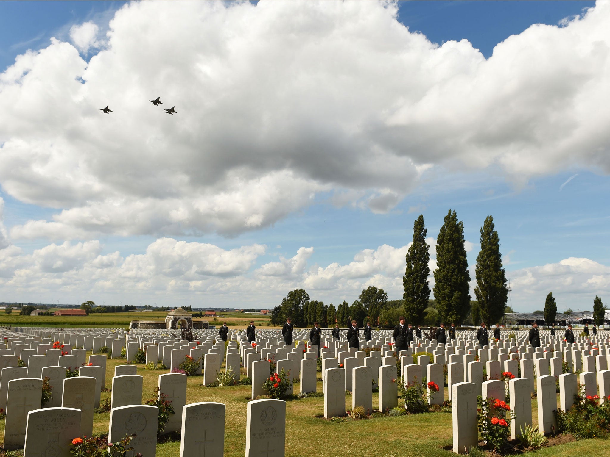 A military flypast over Tyne Cot Commonwealth War Graves Cemetery in Ypres