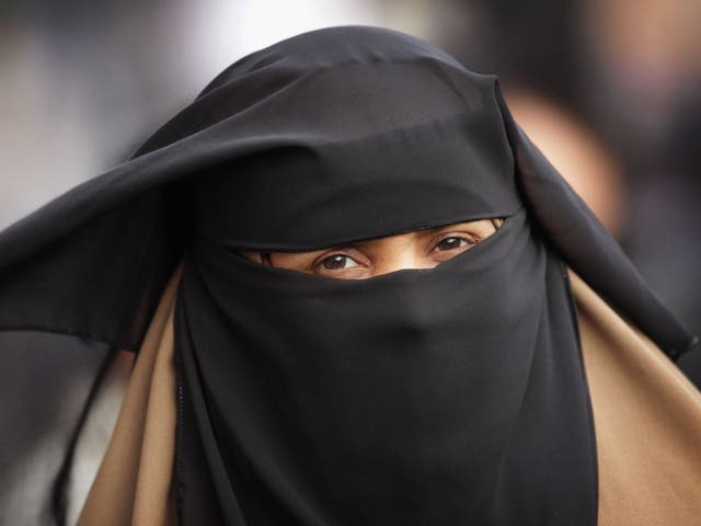 The move has been interpreted as a ban on Islamic facial coverings