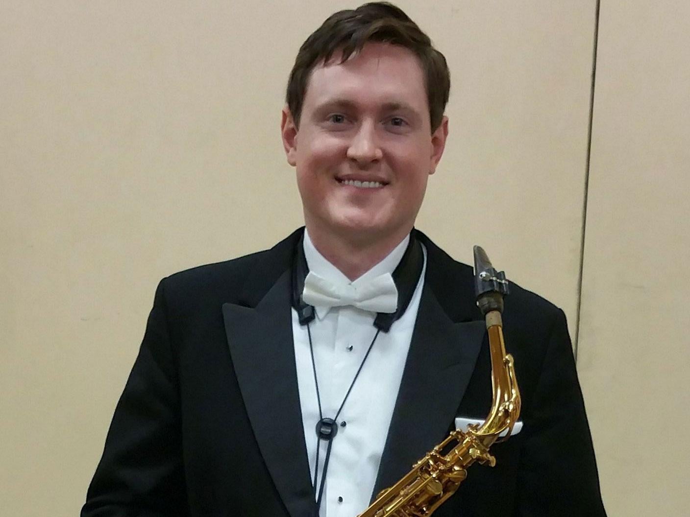 Chris Toon teaches saxophone and flute at Nottingham High School