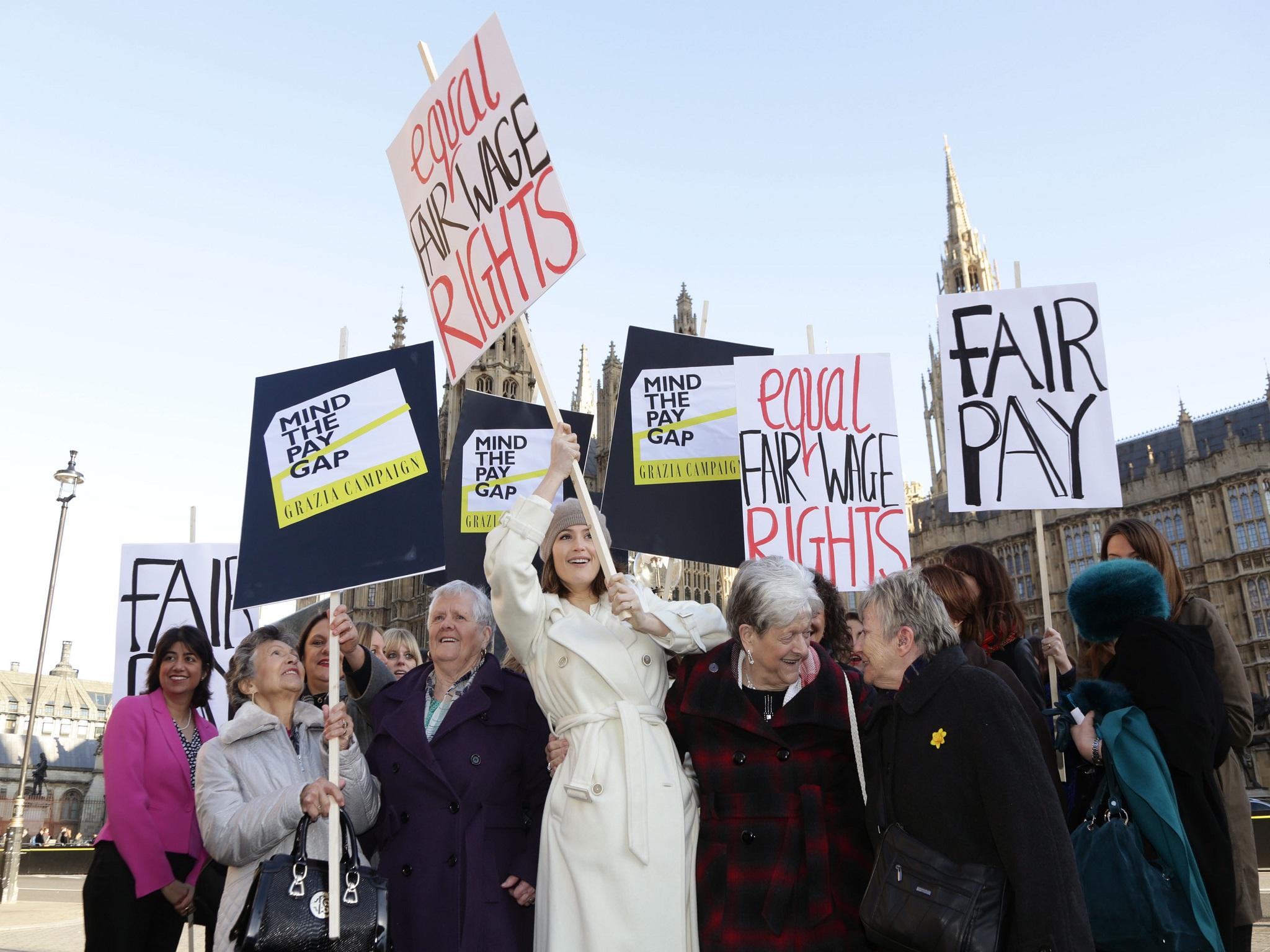 Gemma Arterton (centre) with original Dagenham women strikers and cast of the musical ‘Made in Dagenham’ call for equal pay outside Parliament earlier this year