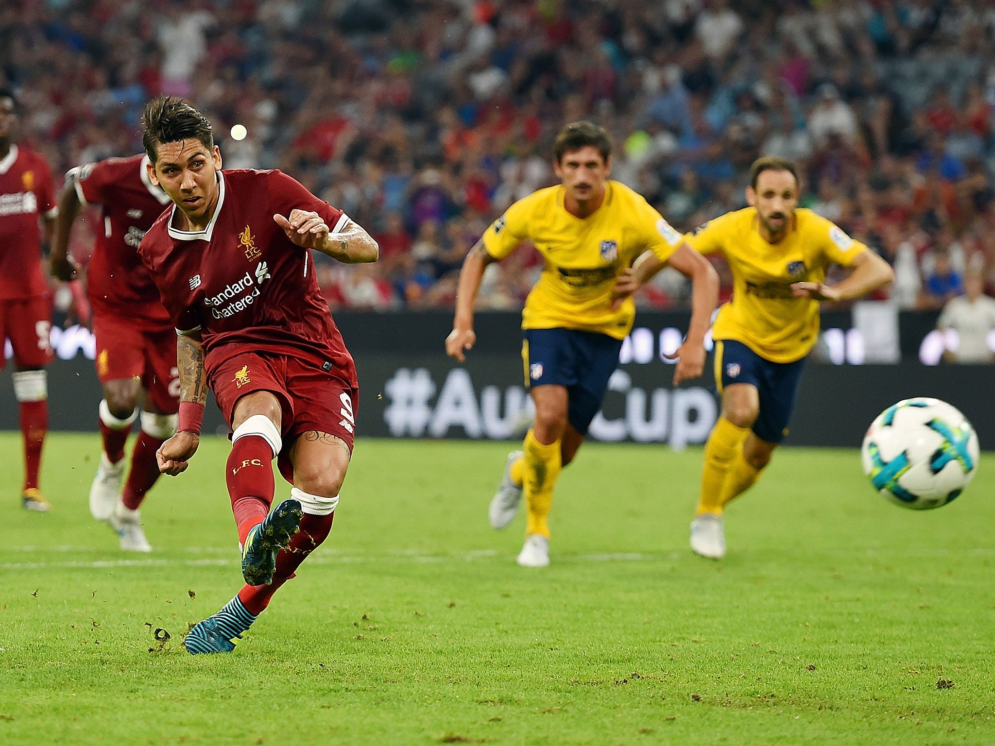 Firmino draws Liverpool level from the spot