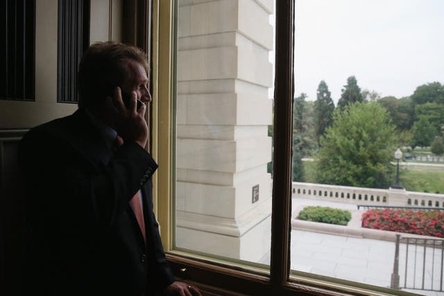 Jeff Flake looks out window in Capitol building in Washington, DC