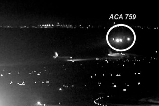 Moment Air Canada flight pulled up to land again over taxiway