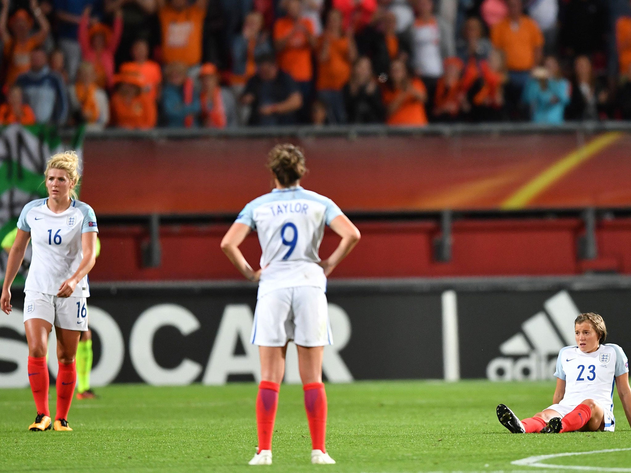 England's dejected players look on after defeat