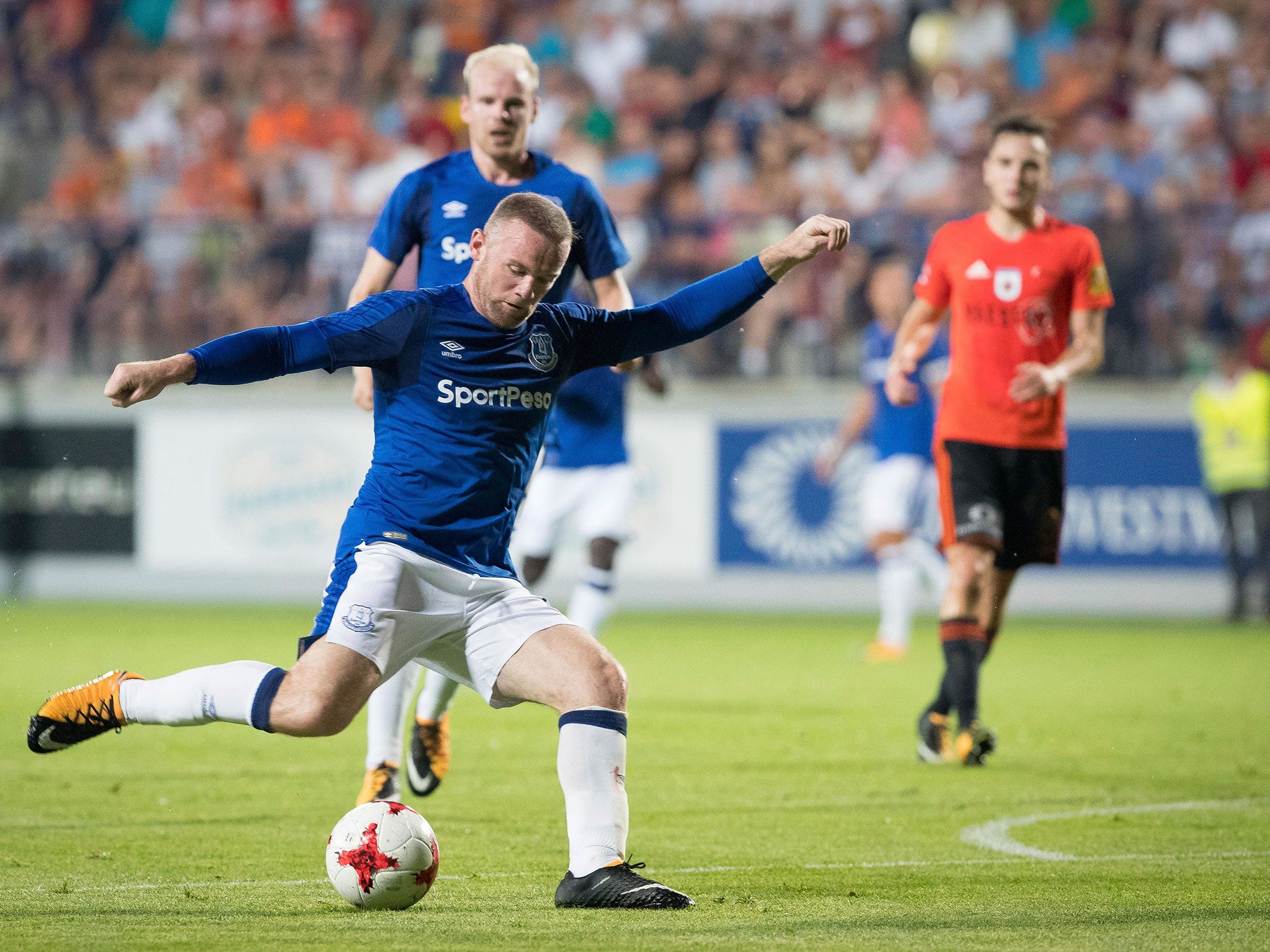 Rooney takes a shot on goal