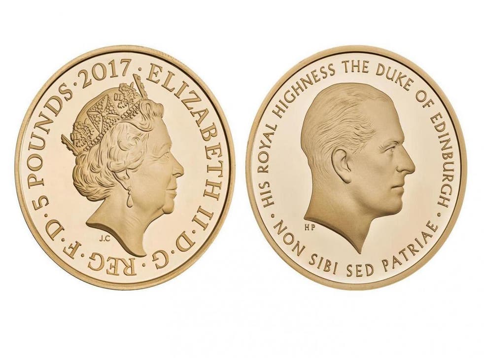 The new £5 coin launched by the Royal Mint marking Prince Philip's end to royal duties