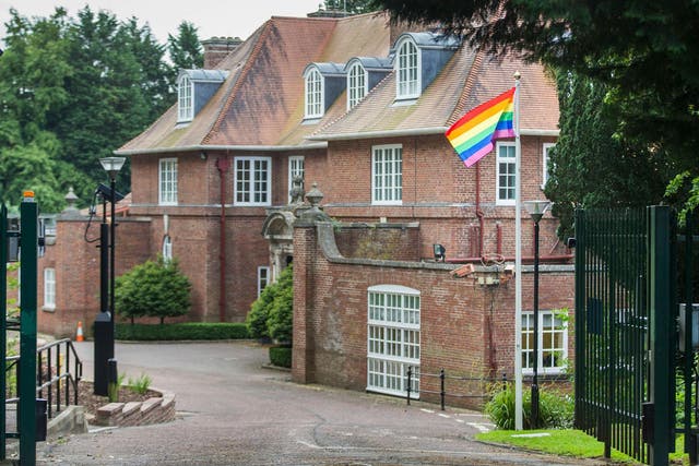 The flag-raising comes amid a long-running political dispute on the region’s ban on same-sex marriage