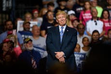 Trump celebrates as Dow Jones hits record high following jobs increase