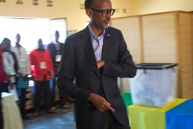 Rwandan President Paul Kagame arrives to cast his ballot in Rwanda's capital Kigali