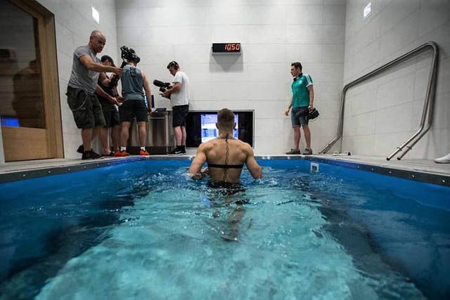 McGregor running on the underwater treadmill at the UFC's Performance Institute