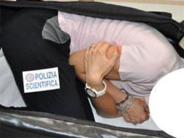 A Milan state police reconstruction showing how the model might have been stuffed inside a suitcase during the kidnapping