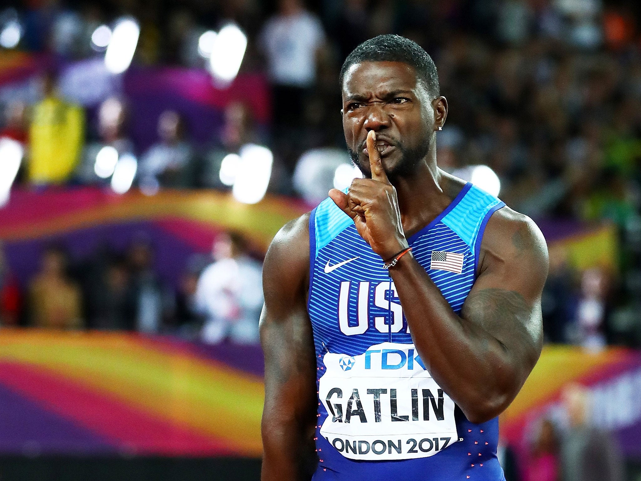 Justin Gatlin gestures to the crowd after his gold-winning performance