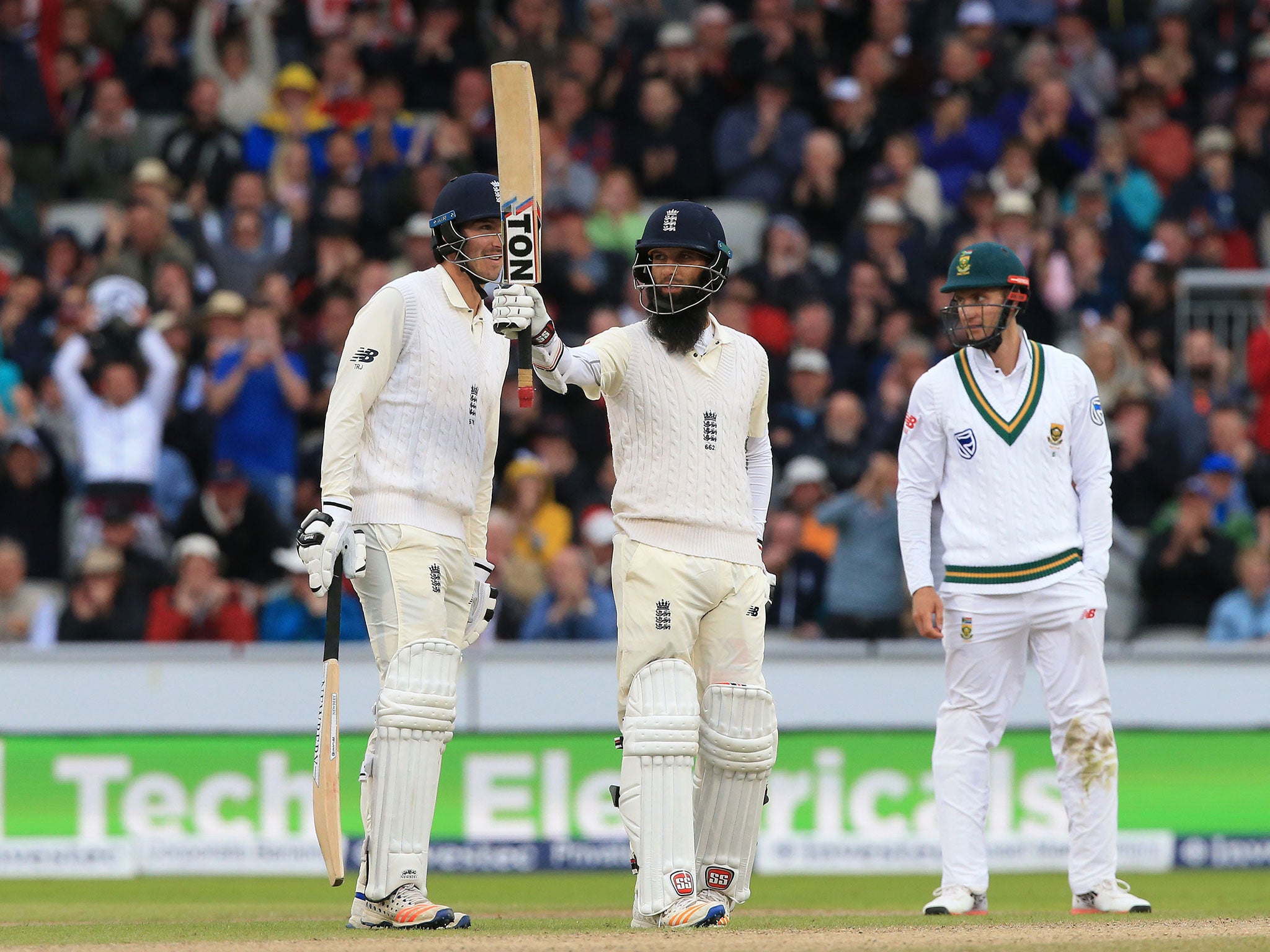 Moeen Ali celebrates his half century for England on the third day