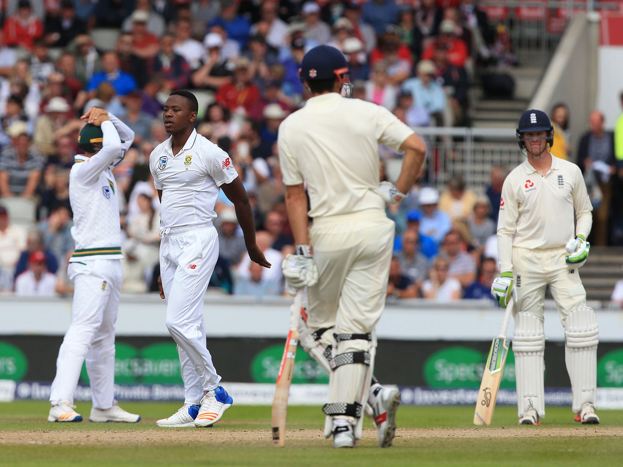 Kagiso Rabada reacts to a dropped catch by Quinton de Kock off the batting of Keaton Jennings