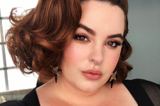 Plus size model Tess Holiday hits out at man for post about curvy wife