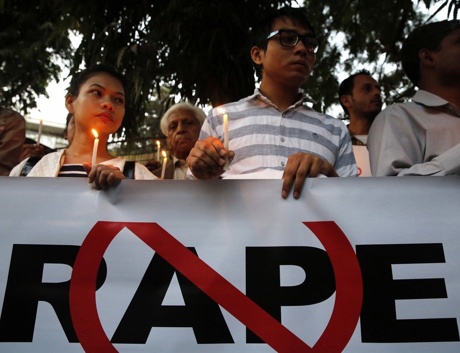 Indian winter: protestors in New Delhi hold a vigil after a woman was raped in February