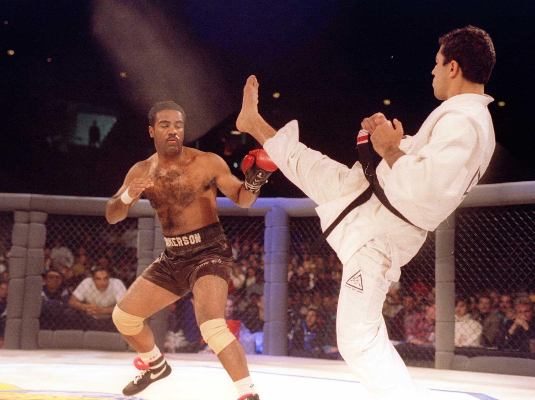 Jimmerson (left) in action against jiu-jitsu specialist Royce Gracie at UFC 1