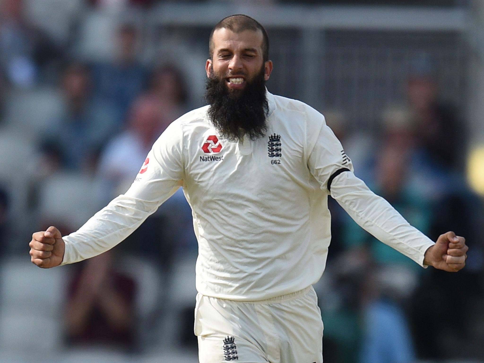 Moeen Ali celebrates after taking the final wicket to secure England's fourth Test victory over South Africa